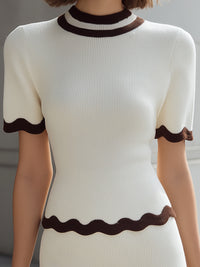 Ivory Ribbed Knit Top And Skirt Set With Contrasting Fan-Shaped Piping