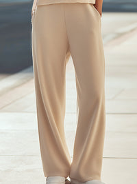 Ivory Sleeveless Knit Top And Wide-Leg Pants Set
