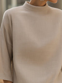 Relaxed Mock-Neck Textured Wide-Sleeve Blouse