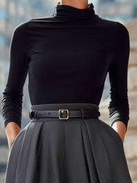 Black Turtleneck With High-Waisted Pleated Belted Skirt