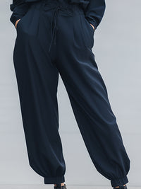 Relaxed High-Neck Long Sleeve Drawstring Jumpsuit