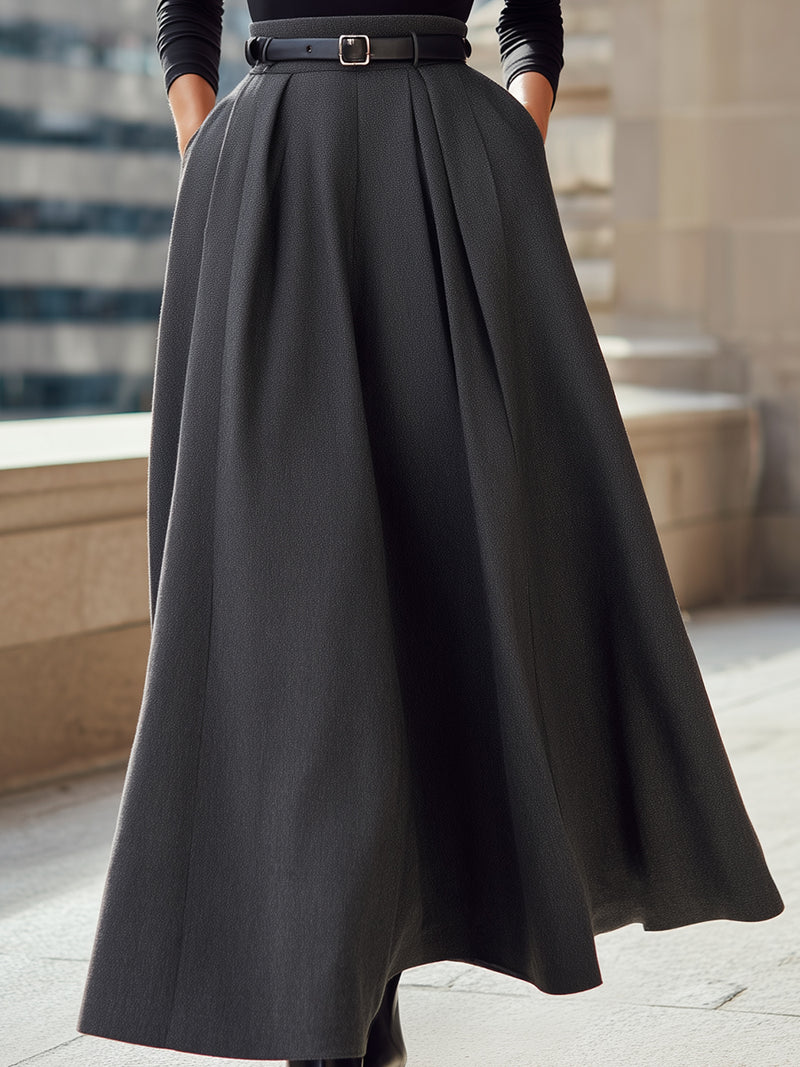 Black Turtleneck With High-Waisted Pleated Belted Skirt