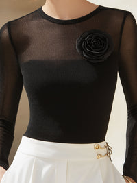 Elegant Sheer Knit Top With Statement Floral Appliqué