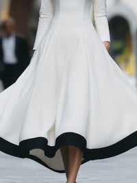 Monochrome Elegance High-Neck A-Line Midi Dress
