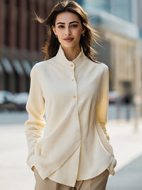Elegant Cream Button-Up Shirt With Subtle Pleats