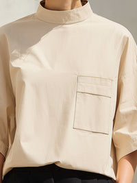 Minimalist High-Neck Loose-Fit Half-Sleeve Blouse – Modern Casual Chic Top