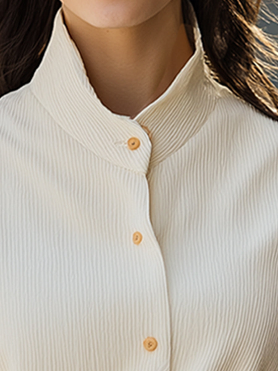 Elegant Cream Button-Up Shirt With Subtle Pleats